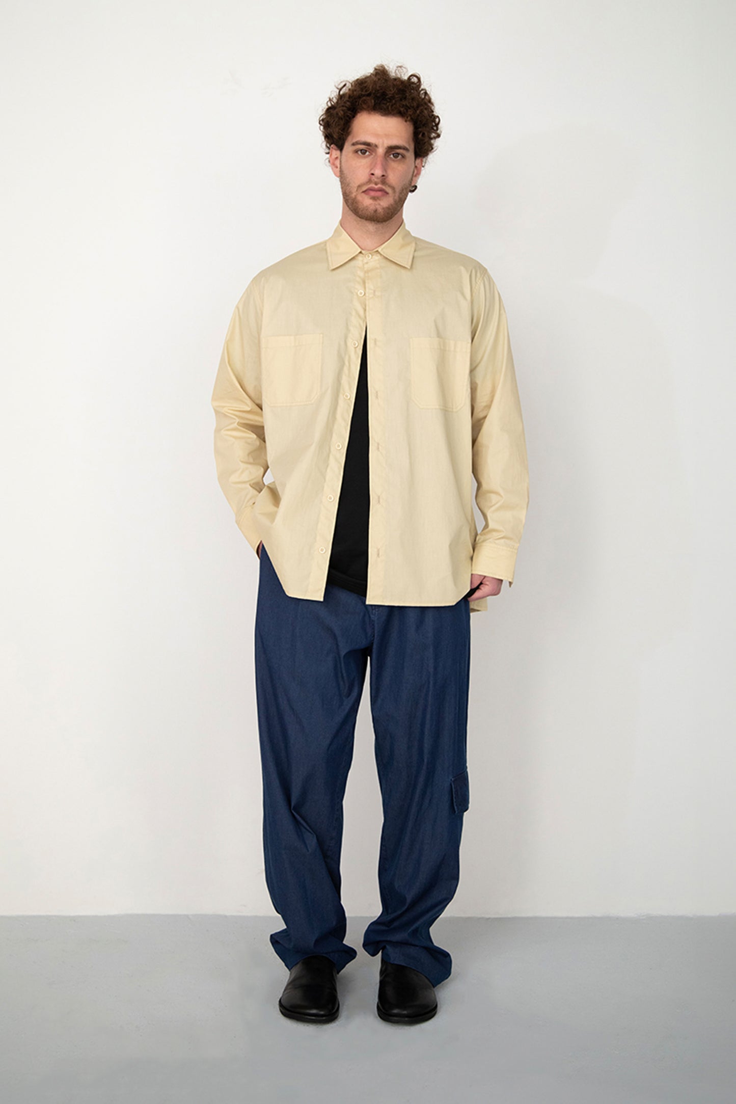 RINSED INDIGO PIGMENT DYED BAGGY TROUSERS WITH SIDE POCKET