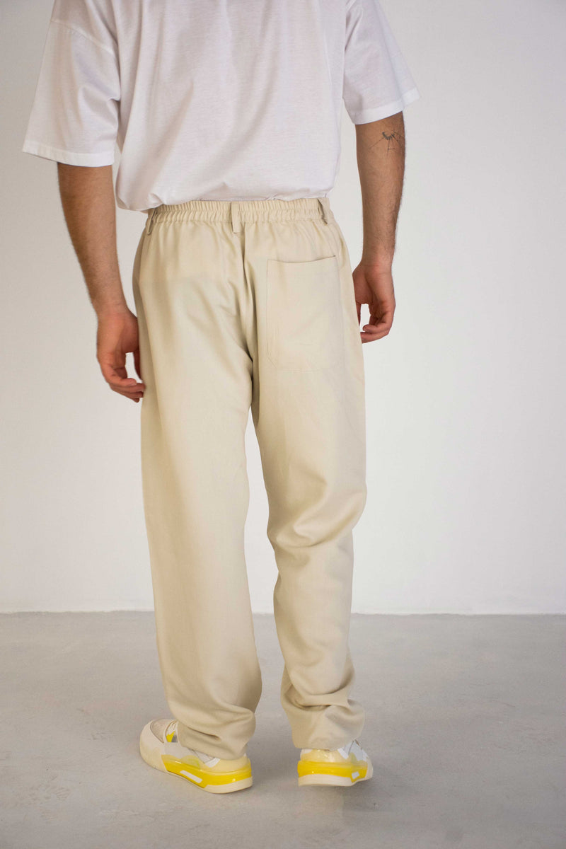 CREAM CUPRO TROUSERS