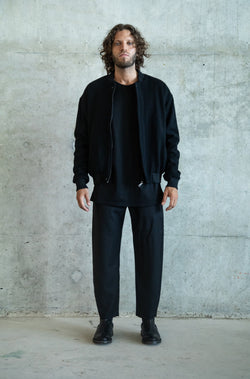 ANGLED HEM BLACK WOOL GABARDINE TROUSERS WITH CUSTOM EMBROIDERIES