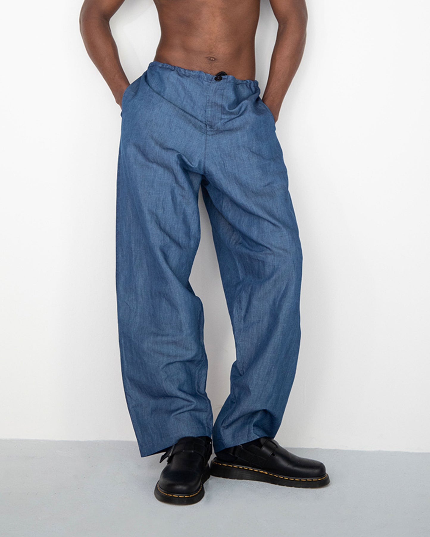 WIDE DRAPED WASHED BLUE LINEN DENIM TROUSERS WITH ROPE