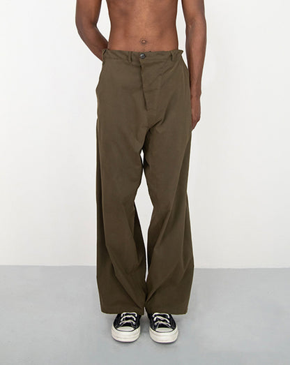 CONSTRUCTED KAKI TROUSERS WITH DIAGONAL BUTTONED FLY