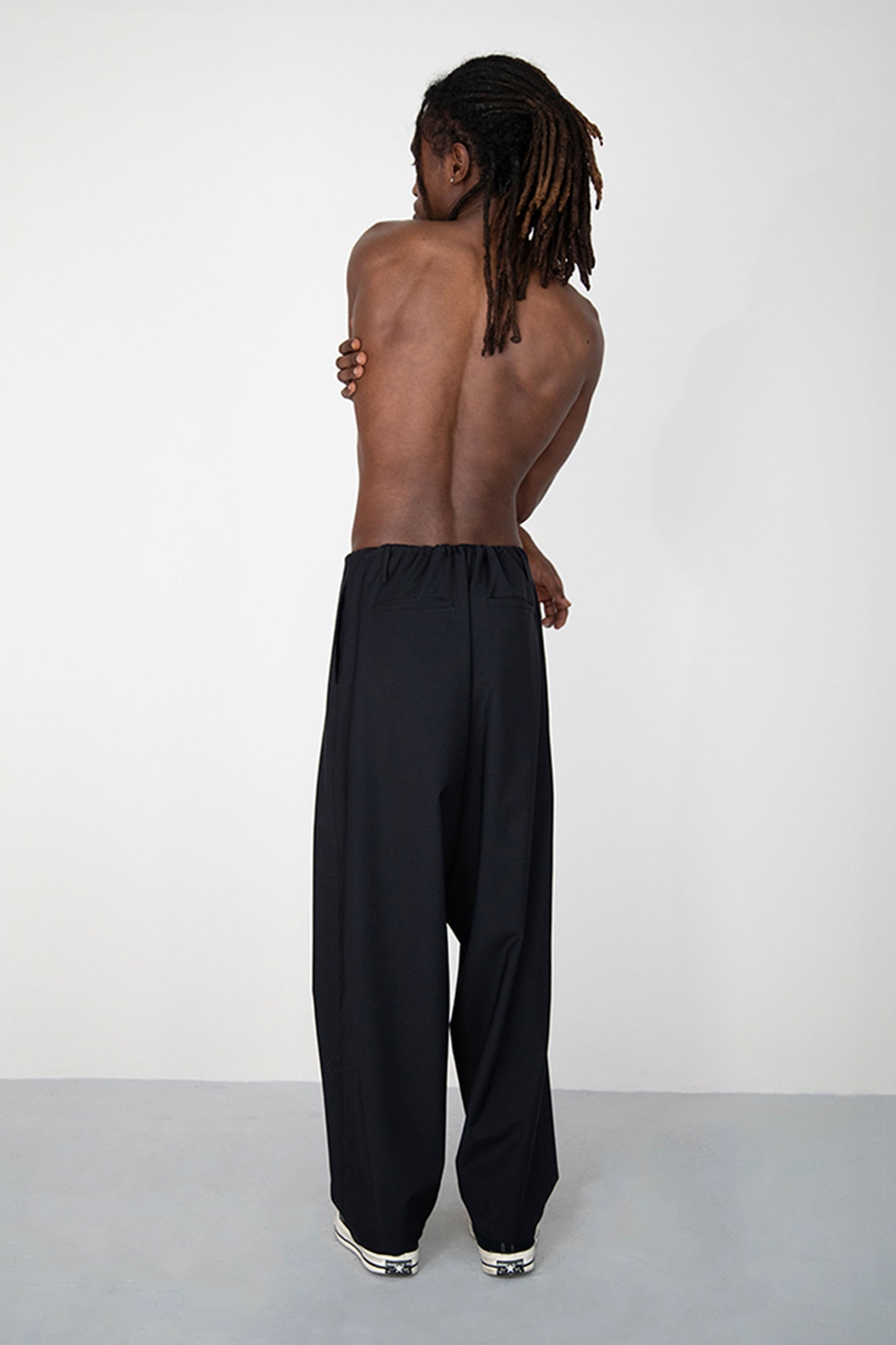 WIDE DRAPED BLACK SUMMER WOOL TROUSERS WITH ROPE