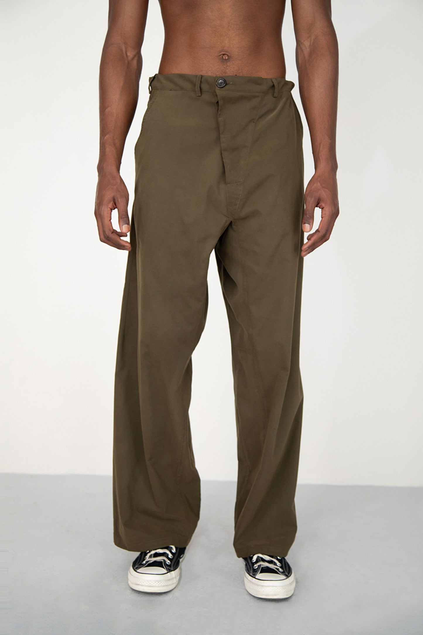 CONSTRUCTED KAKI TROUSERS WITH DIAGONAL BUTTONED FLY