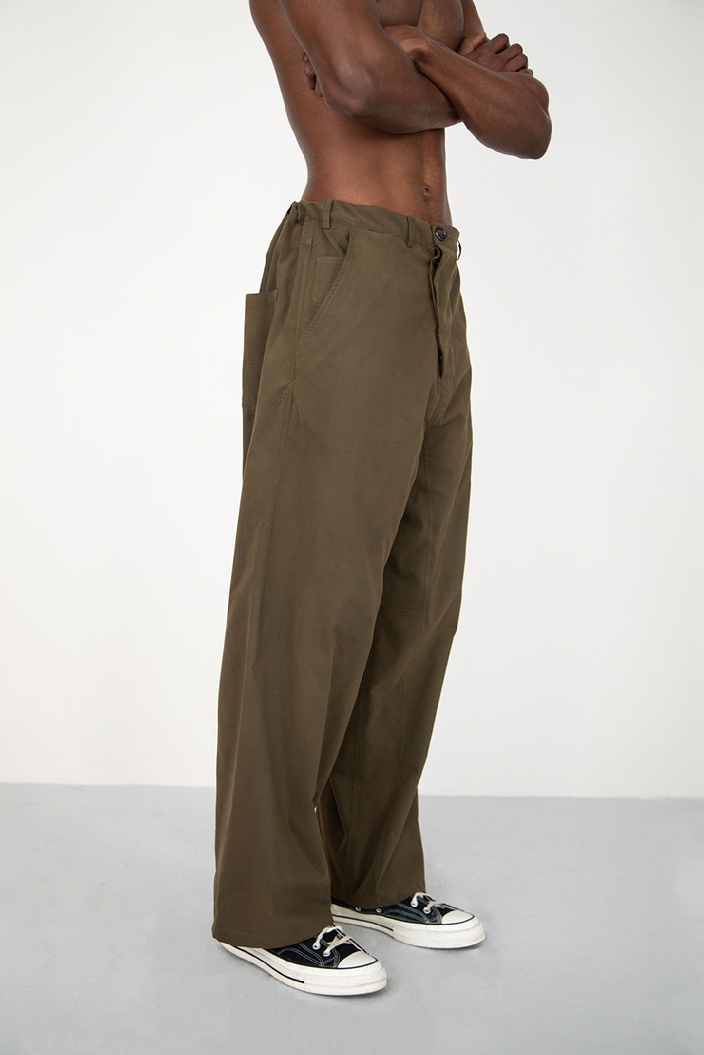 CONSTRUCTED KAKI TROUSERS WITH DIAGONAL BUTTONED FLY