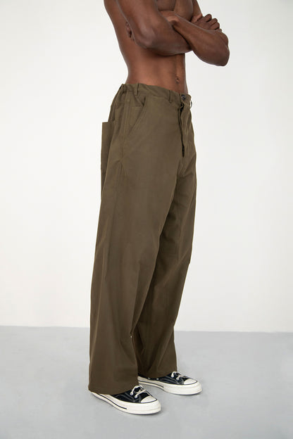 CONSTRUCTED KAKI TROUSERS WITH DIAGONAL BUTTONED FLY
