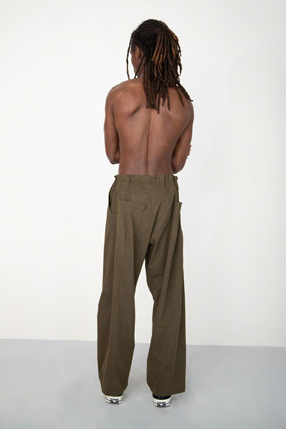 CONSTRUCTED KAKI TROUSERS WITH DIAGONAL BUTTONED FLY