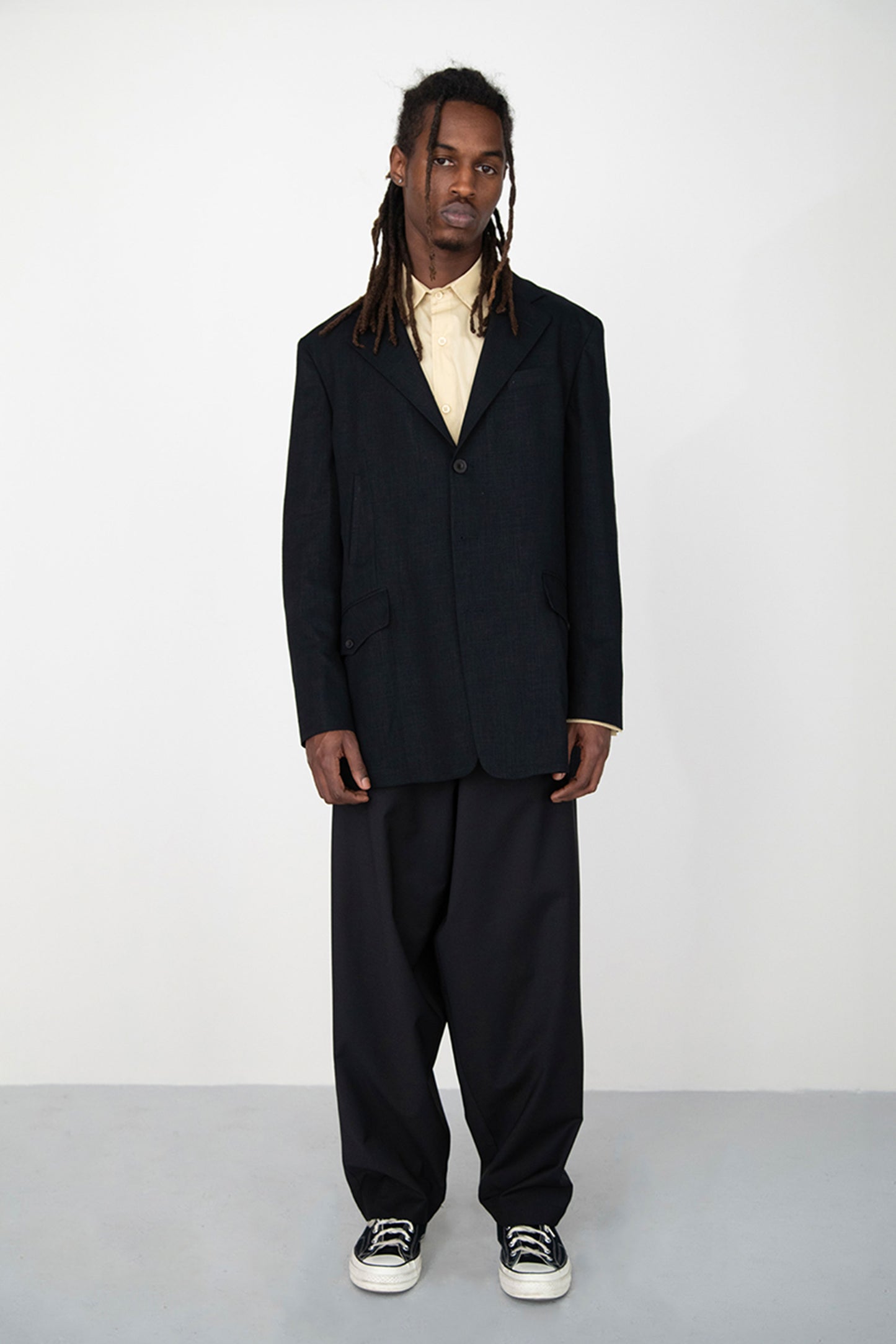WIDE DRAPED BLACK SUMMER WOOL TROUSERS WITH ROPE