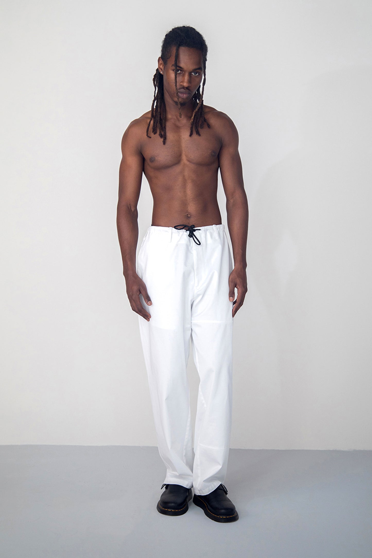 YOKE SEAM COTTON GABARDINE TROUSERS