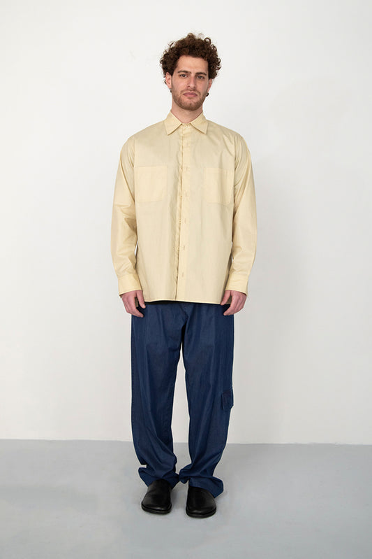 RINSED INDIGO PIGMENT DYED BAGGY TROUSERS WITH SIDE POCKET
