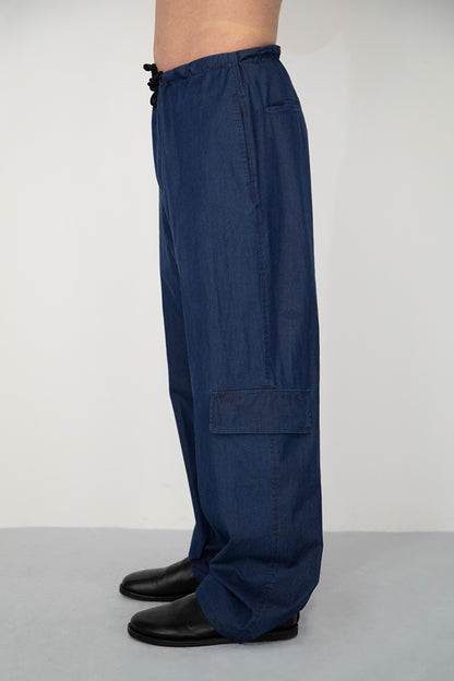 RINSED INDIGO PIGMENT DYED BAGGY TROUSERS WITH SIDE POCKET