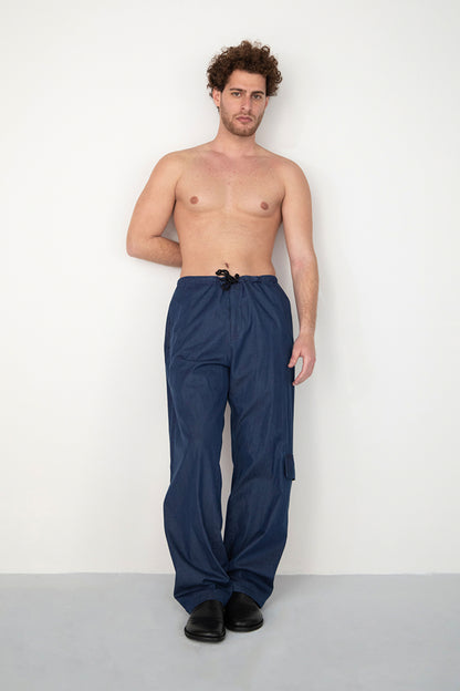 RINSED INDIGO PIGMENT DYED BAGGY TROUSERS WITH SIDE POCKET